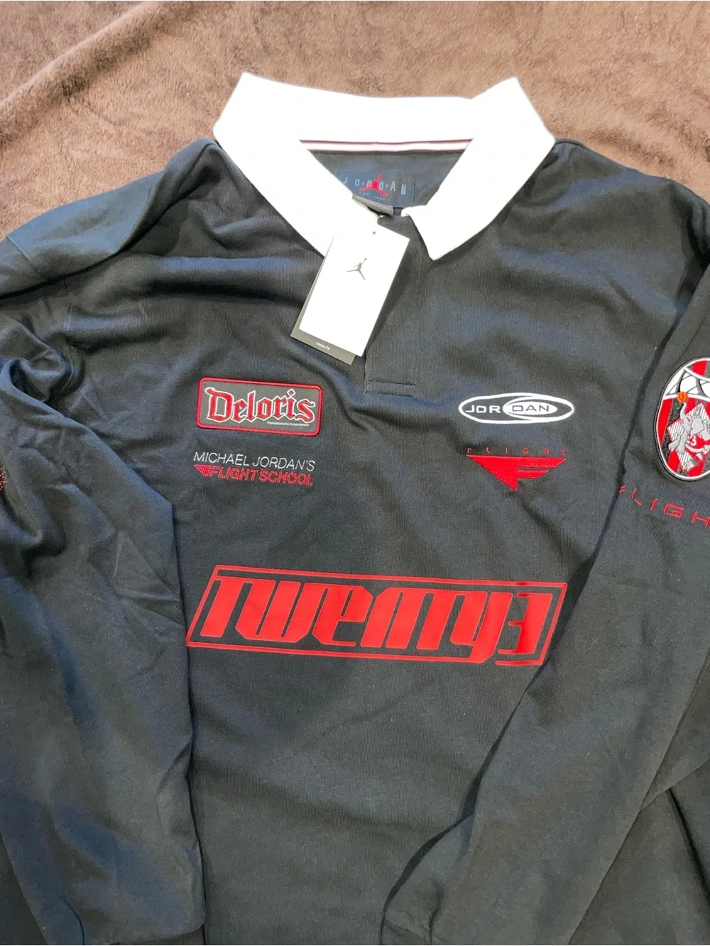 Jordan Black Long-Sleeve Rugby Polo with Red Accents and White Collar